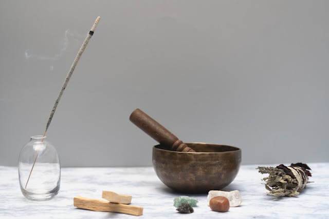 Items sitting on a table used in a spiritual cleanse.