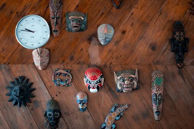 Ancient demon masks representing the signs of demonic possession.