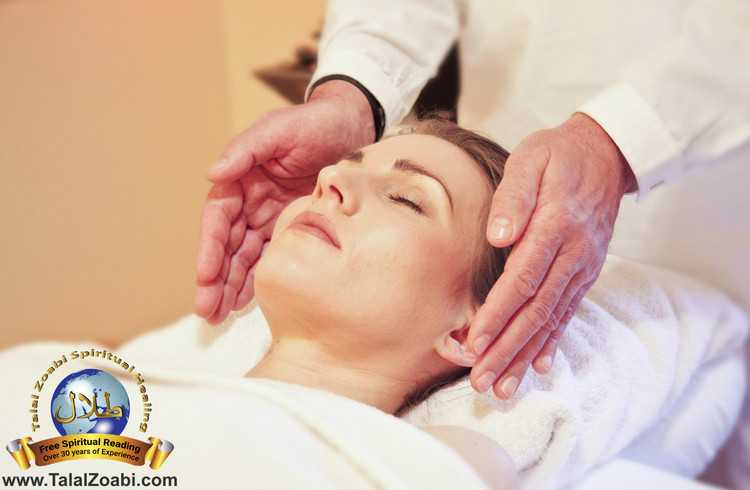 Woman laying in a healing center having treatment.