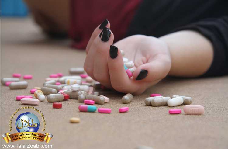 Signs of demonic possession, woman's hand holding pills, laying on the floor.