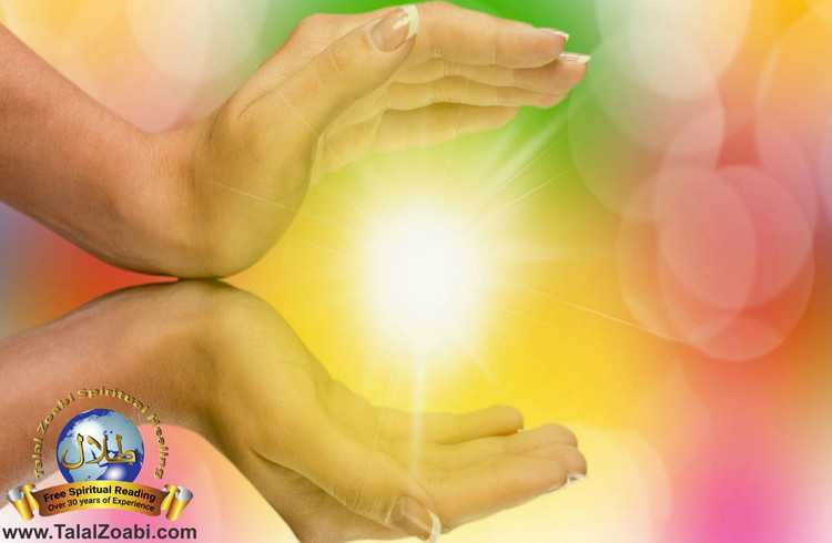 Spiritual healer hands with energy coming out to show how to heal yourself spiritually.