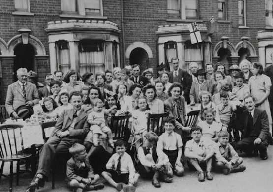 Large black and white family photo showing signs of generational curses.